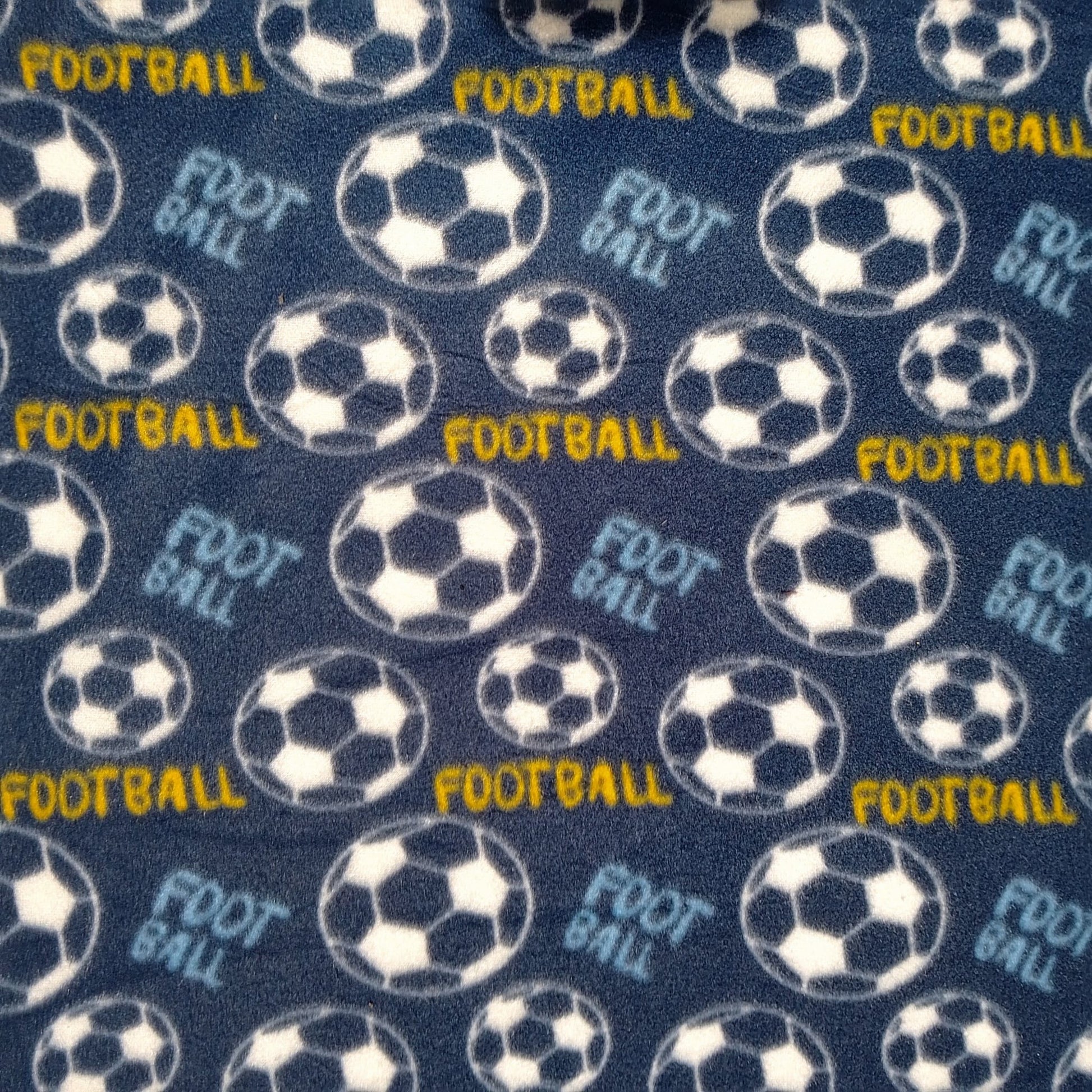 Printed Polar Fleece Football Navy - Ragland Fabrics