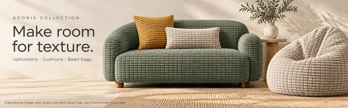 Make room for texture. Adonis Corduroy shown on a Forest sofa, Bronze and Sand cushions, and a Sand beanbag.