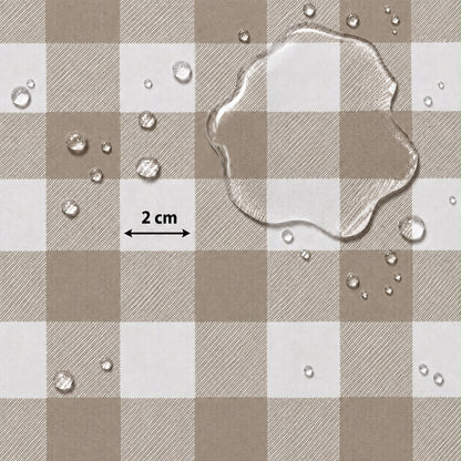 A close-up of a brown and off-white checkered surface with water droplets and a large clear water puddle on top, plus a black '2 cm' arrow indicating scale.