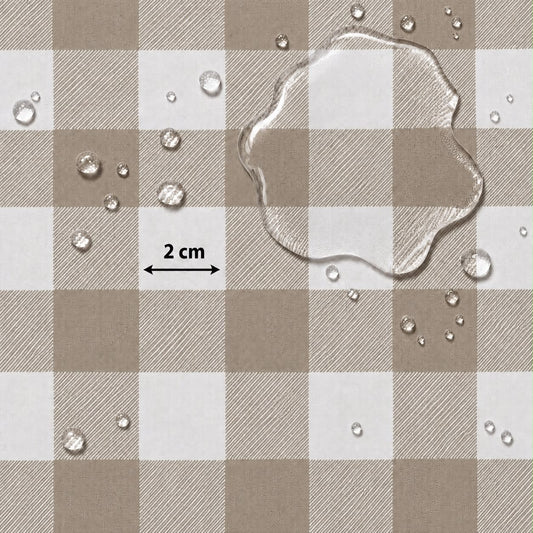 A close-up of a brown and off-white checkered surface with water droplets and a large clear water puddle on top, plus a black '2 cm' arrow indicating scale.