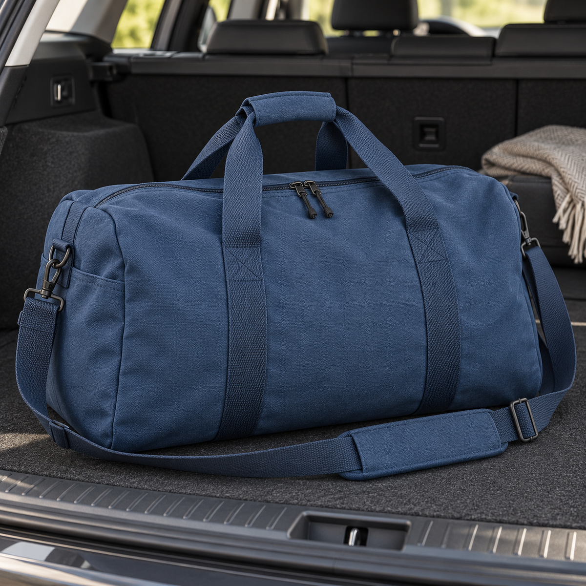 Melvin & Motley Navy J16 canvas practical-use inspiration: weekend duffel in a tidy vehicle boot