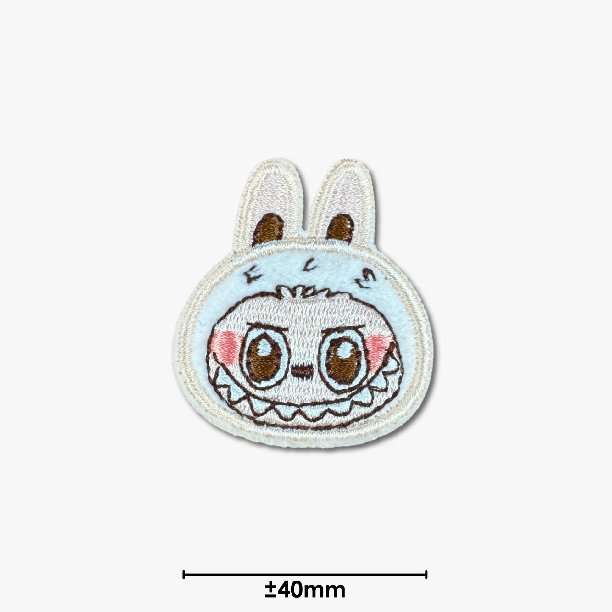 Motif Iron On Badge - Labubu Grin - Ragland Fabrics