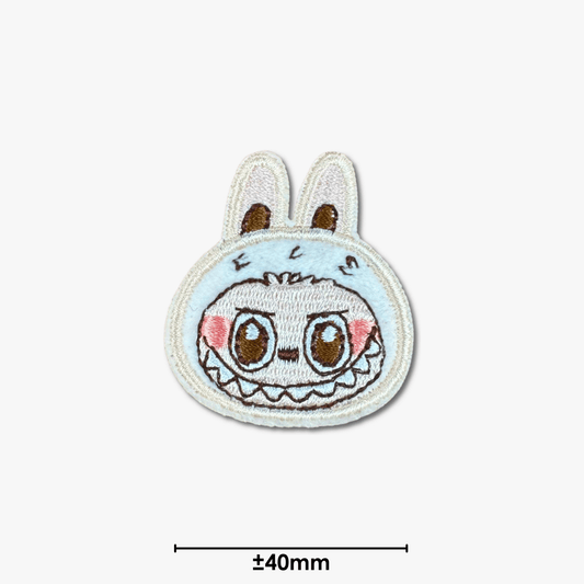 Motif Iron On Badge - Labubu Grin - Ragland Fabrics