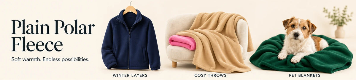 Plain Polar Fleece sewing inspiration: a navy fleece jacket, a beige cosy throw with a pink accent, and a dog resting on a bottle-green fleece pet blanket.