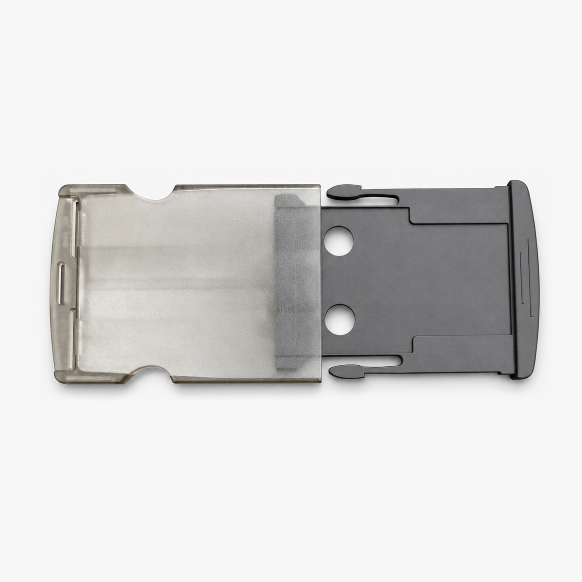 Quick release buckle with translucent smoke-grey housing and dark-grey slide insert
