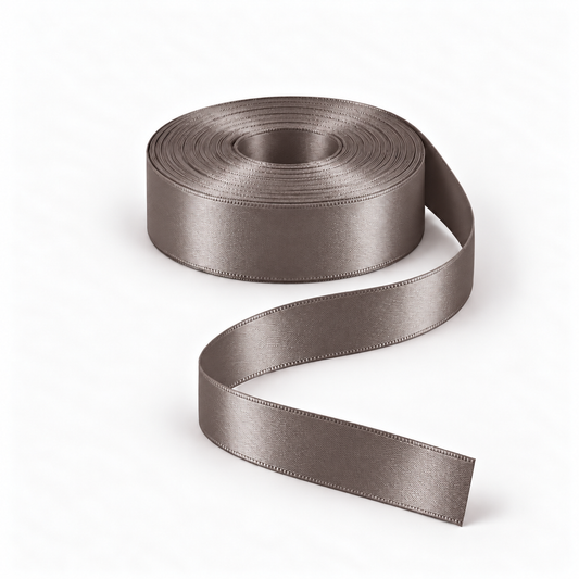 Ragland Fabrics satin ribbon 25mm, Dark Grey #3171, broad ribbon roll and flowing ribbon on white.