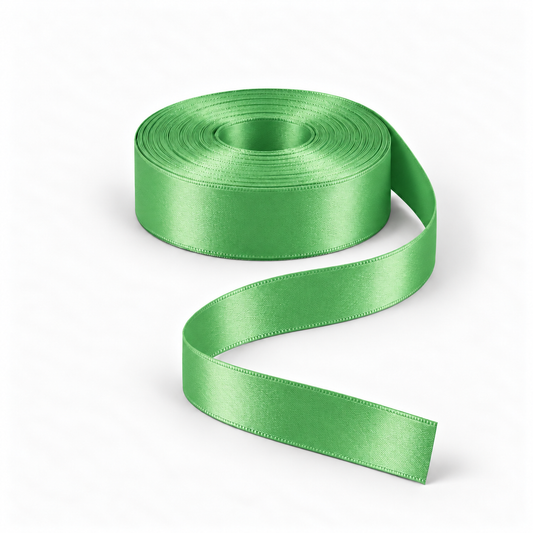 Ragland Fabrics satin ribbon 25mm, Emerald Green #23, broad ribbon roll and flowing ribbon on white.