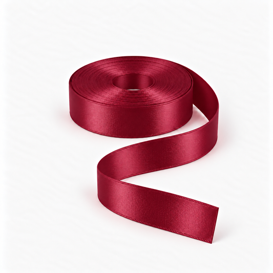 Satin Ribbon 25mm Maroon #123, flat coil with flowing S-shaped satin ribbon.