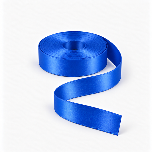Satin Ribbon 25mm Royal Blue #243, flat coil with flowing S-shaped satin ribbon.