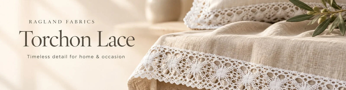 Torchon Lace — timeless detail for home and occasion. White Torchon lace edging on natural table linen and an ivory cushion.