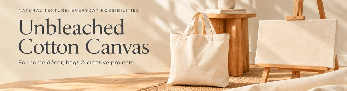 Unbleached Cotton Canvas collection banner featuring a natural canvas tote bag and a blank artist canvas on a wooden easel.