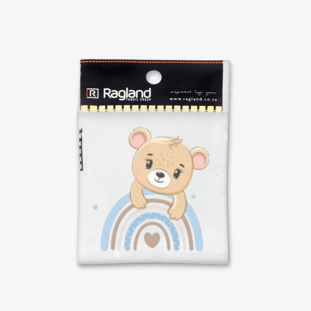 Motif Iron On Badge - Teddy On Rainbow - Ragland Fabrics