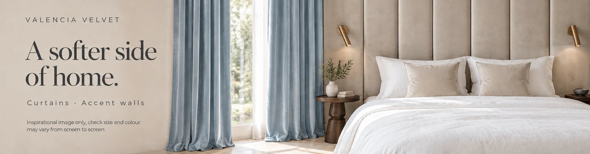 Valencia Velvet inspiration: Nordic blue curtains and a Perlino velvet accent wall in a calm bedroom. A softer side of home.